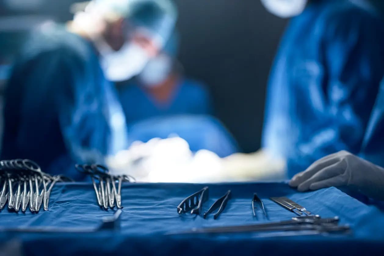 Surgical instruments staged on the OR table during a Bolt-guided case