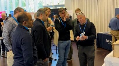 Attendees engaging with the Bolt team at the Belgian International Spine Symposium