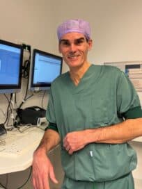 Surgeon in the OR near the completion of the multi-center RCT
